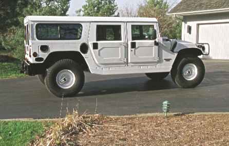 Side View of 98 White Hummer  (17220 bytes)
